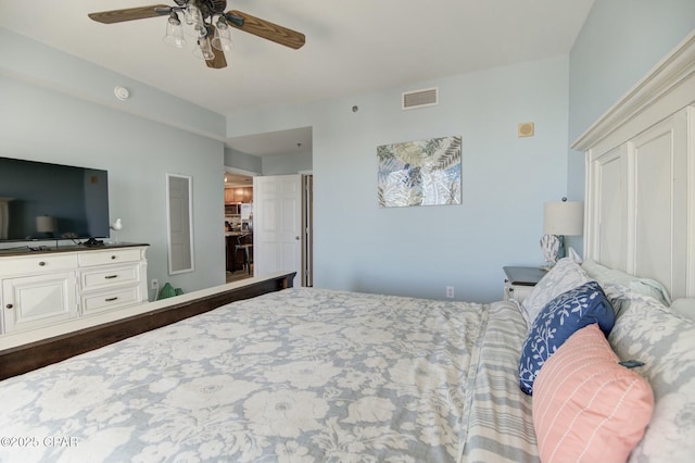 bedroom featuring visible vents and ceiling fan