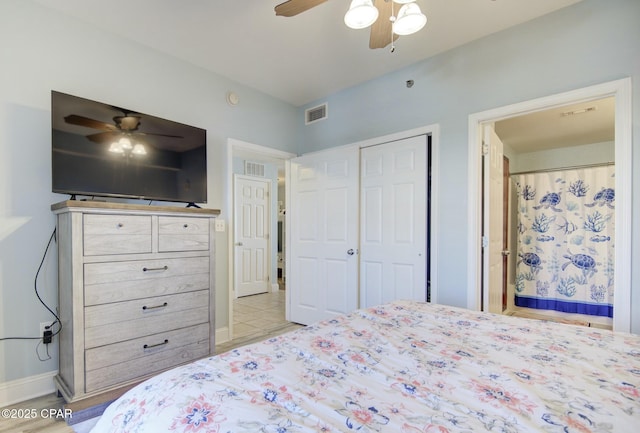 bedroom featuring a closet, visible vents, and a ceiling fan