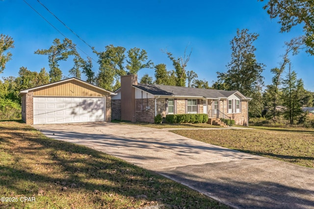 single story home with brick siding, a chimney, an outdoor structure, and a front yard