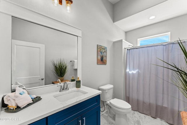 bathroom with a shower with curtain, toilet, marble finish floor, and vanity