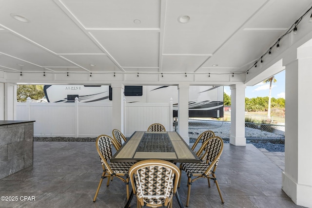 view of patio / terrace featuring outdoor dining area and fence