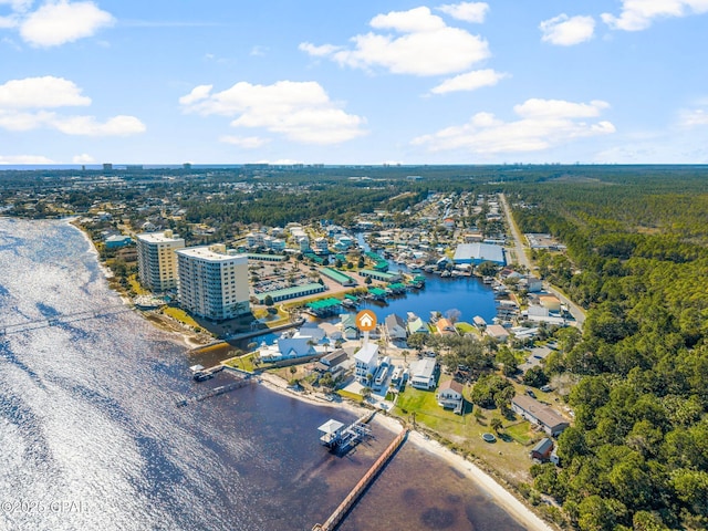 birds eye view of property featuring a water view and a view of city