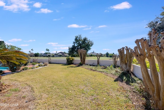 view of yard with fence