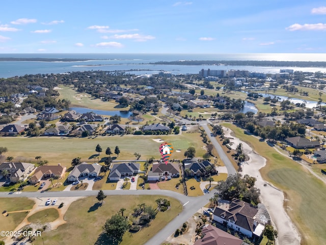 bird's eye view with a residential view and a water view