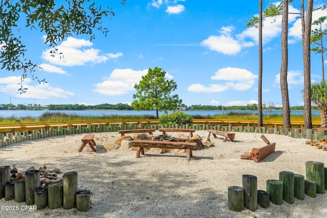 view of community with a water view
