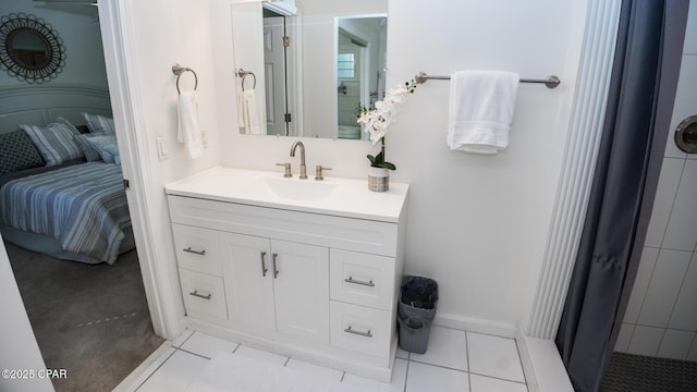 bathroom featuring ensuite bath, tile patterned flooring, a shower with curtain, and vanity