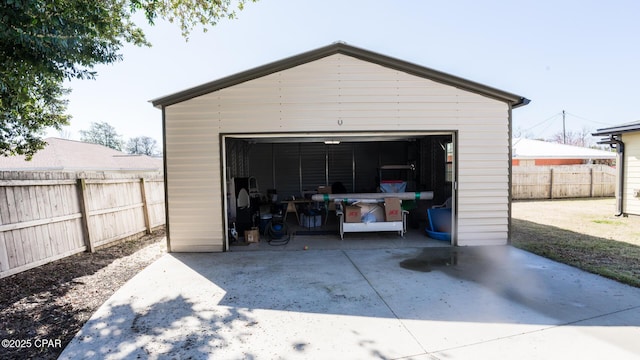 detached garage with fence