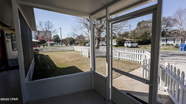 sunroom / solarium with a healthy amount of sunlight