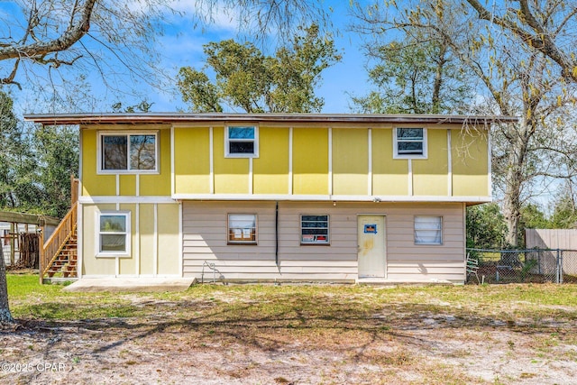 819 Russ Lake Dr, Panama City, FL 32404 - back of property with stairs and fence