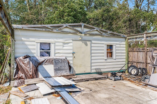 819 Russ Lake Dr, Panama City, FL 32404 - view of outbuilding featuring an outdoor structure and fence