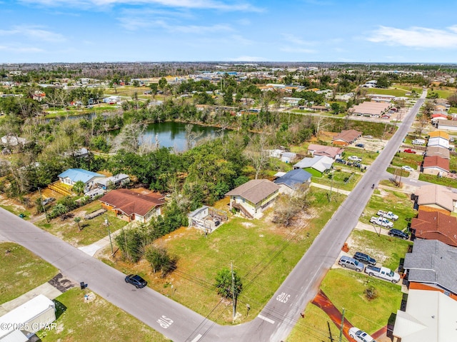 819 Russ Lake Dr, Panama City, FL 32404 - drone / aerial view with a residential view and a water view