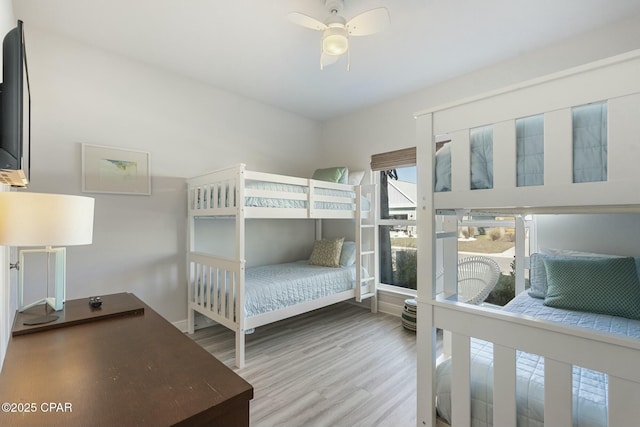 358 Sea Grove Way, Port St Joe, FL 32456 - bedroom with wood finished floors and a ceiling fan