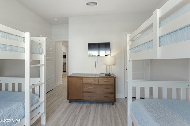 358 Sea Grove Way, Port St Joe, FL 32456 - bedroom featuring light wood-type flooring and baseboards