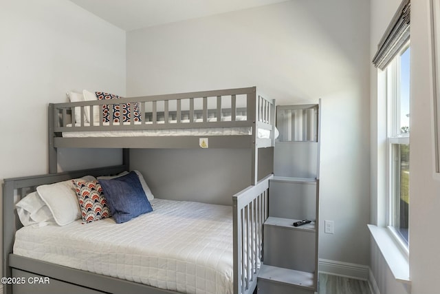 358 Sea Grove Way, Port St Joe, FL 32456 - bedroom featuring baseboards and wood finished floors