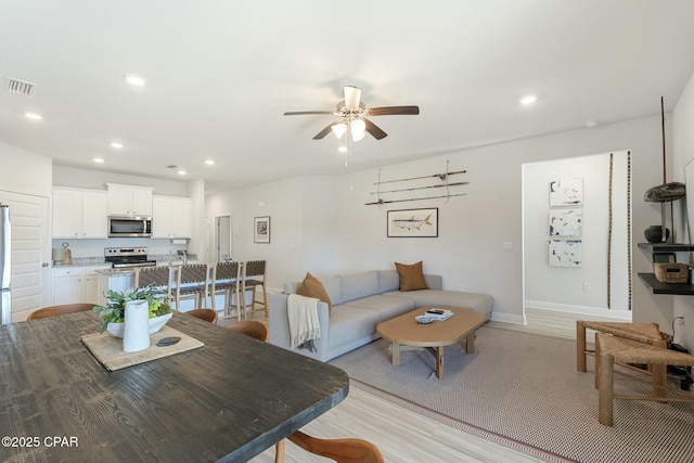 358 Sea Grove Way, Port St Joe, FL 32456 - living area with a ceiling fan, recessed lighting, and light wood-type flooring