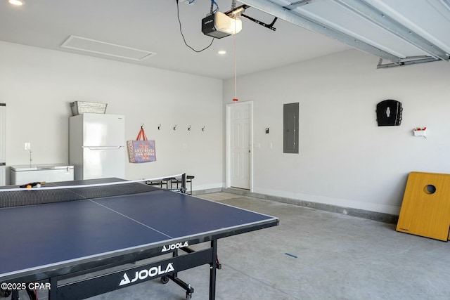 358 Sea Grove Way, Port St Joe, FL 32456 - playroom featuring electric panel, concrete floors, and recessed lighting