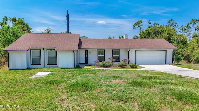 ranch-style home with a garage, driveway, a shingled roof, a chimney, and a front lawn