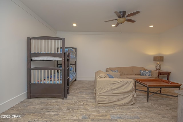 bedroom featuring recessed lighting, ceiling fan, baseboards, and wood finished floors