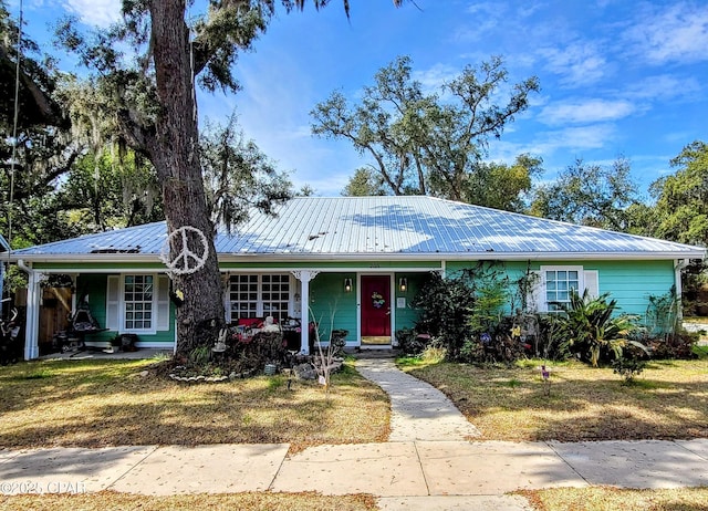 205 Harmon Ave, Panama City, FL 32401 - single story home featuring covered porch and metal roof