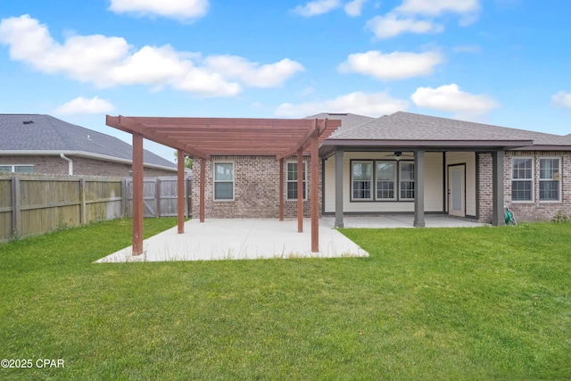 3730 Cedar Park Dr, Panama City, FL 32404 - back of property with a patio, a pergola, brick siding, fence, and a lawn