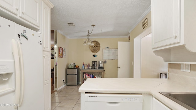 kitchen with ornamental molding, white appliances, visible vents, and a peninsula