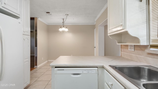 kitchen featuring white appliances, visible vents, and white cabinetry