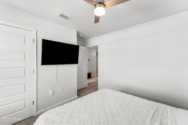 bedroom featuring carpet, visible vents, ceiling fan, and baseboards