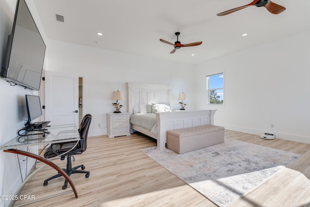 bedroom featuring light wood-style floors, visible vents, and recessed lighting