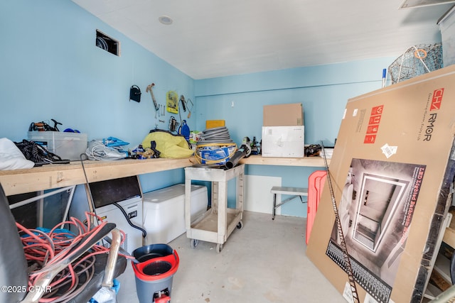 interior space featuring concrete flooring