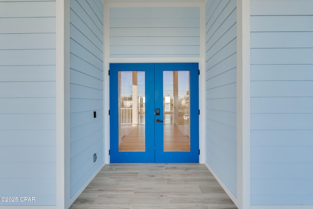 doorway to property featuring french doors