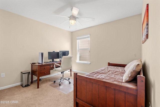 bedroom featuring light carpet, ceiling fan, and baseboards