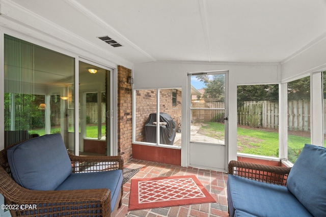 sunroom featuring visible vents