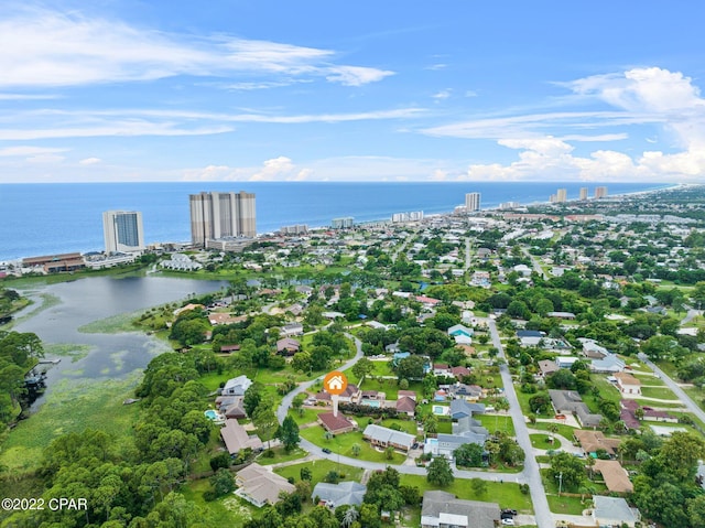 bird's eye view featuring a view of city and a water view