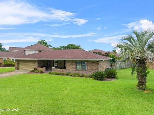 single story home with concrete driveway, covered porch, fence, a garage, and a front lawn