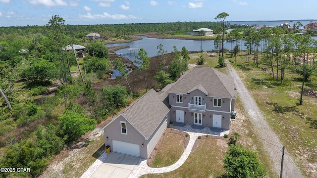 bird's eye view with a water view