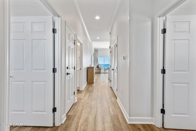 6627 Thomas Dr Unit 1702, Panama City Beach, FL 32408 - corridor with crown molding, recessed lighting, baseboards, and light wood finished floors
