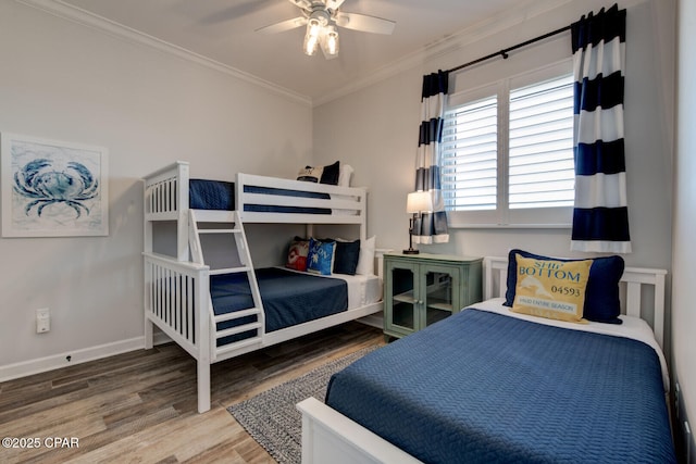 6627 Thomas Dr Unit 1702, Panama City Beach, FL 32408 - bedroom featuring crown molding, wood finished floors, baseboards, and ceiling fan