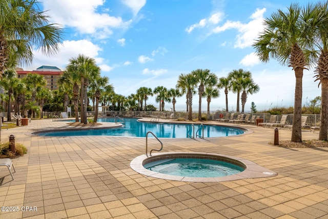 6627 Thomas Dr Unit 1702, Panama City Beach, FL 32408 - community pool with fence, a community hot tub, and a patio area