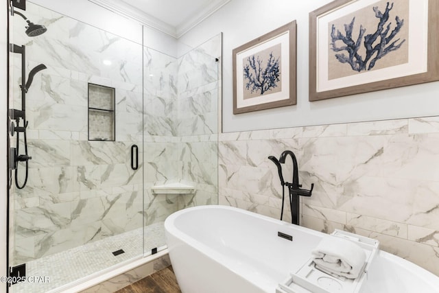 6627 Thomas Dr Unit 1702, Panama City Beach, FL 32408 - full bath with a freestanding bath, a shower stall, tile walls, and ornamental molding