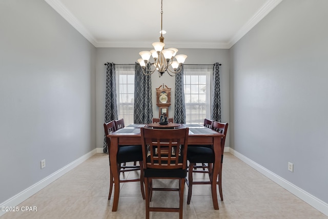 dining room featuring an inviting chandelier, baseboards, and ornamental molding