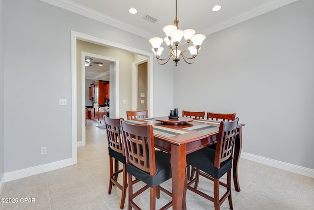 dining area featuring light tile patterned floors, a chandelier, visible vents, baseboards, and crown molding