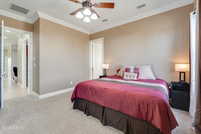 bedroom featuring visible vents, crown molding, and light colored carpet