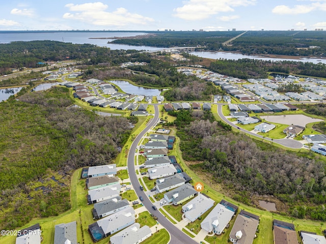 aerial view with a water view and a residential view