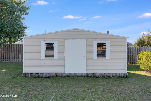 view of outbuilding with an outbuilding and a fenced backyard