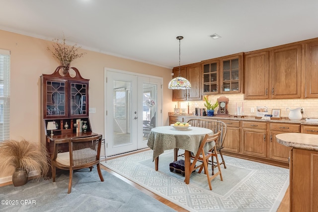 dining area featuring french doors and visible vents