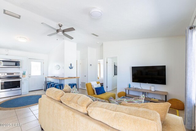 5801 Pinetree Avenue A, B, C & D, Panama City, FL 32408 - living area featuring lofted ceiling, ceiling fan, and light tile patterned flooring