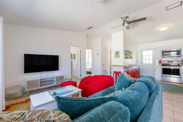 5801 Pinetree Avenue A, B, C & D, Panama City, FL 32408 - living room with lofted ceiling, ceiling fan, and light tile patterned floors