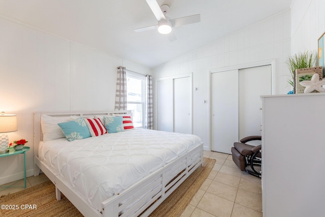 5801 Pinetree Avenue A, B, C & D, Panama City, FL 32408 - bedroom with multiple closets, light tile patterned floors, vaulted ceiling, and a ceiling fan