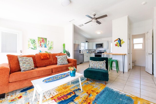 5801 Pinetree Avenue A, B, C & D, Panama City, FL 32408 - living room featuring a ceiling fan, light tile patterned flooring, and lofted ceiling