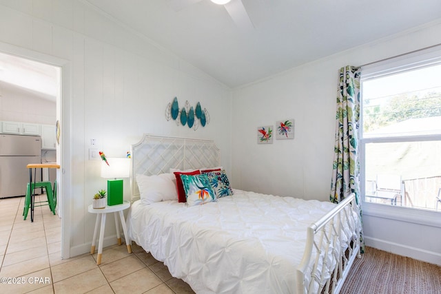 5801 Pinetree Avenue A, B, C & D, Panama City, FL 32408 - bedroom featuring freestanding refrigerator, vaulted ceiling, light tile patterned floors, and a ceiling fan